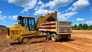 Grading and loading dirt with a Cat 953K track loader!!