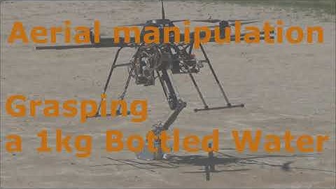 aerial manipulation, grasping a 1kg bottled water, multicopter, drone, robot arm.