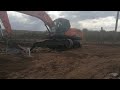 how to move an excavator with one track