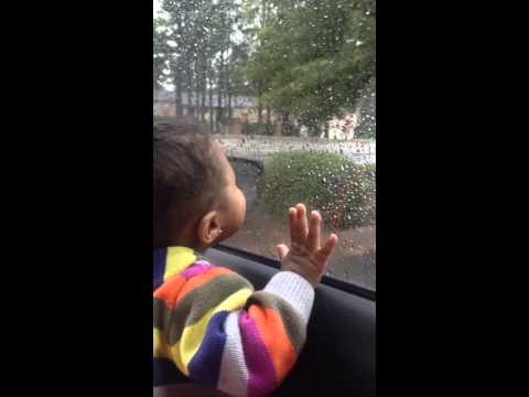 My little girl licking the rain lol