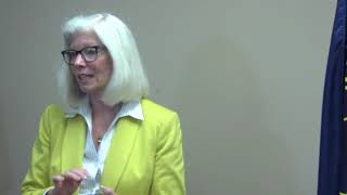 Karen Richards answers questions from media