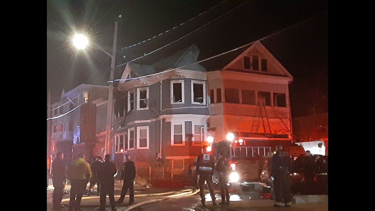 Firefighters recover man from burning home in New Bedford - YouTube