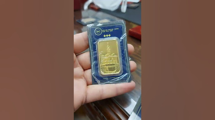 الاستثمار في سبائك الذهب  btc                Gold coins and bars