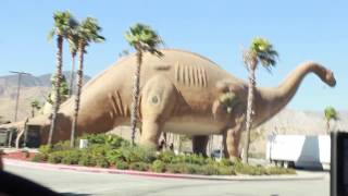 Towering over the san gorgonio pass, a 45 foot dinosaur name dinny
(long neck dinosaur) greets commuters either traveling to palm spring
right after passing ...