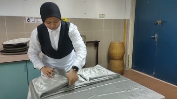 laying and changing table cloth