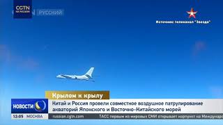 Видео Минобороны РФ, на котором истребитель Су-35 сопровождает бомбардировщика \