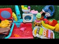 Diy mini food cookingwith cut fruits and vegetables for colorful dish using playdoh and kitchen set