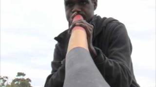 Elijah Gunydjurruwuy playing a G/G yirdaki made by Adam Marrilaga