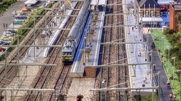 Model Trains in Action at Kontich Railway Station: HO Scale Model Railroad Layout by Paul Celis