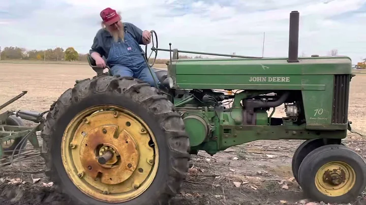 John Deere 70 plowing