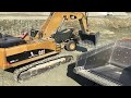 Caterpillar 385C Excavator Loading Caterpillar 773 Dumpers - Kivos Ate