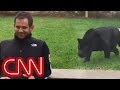 Panther sneaks up behind man and then ...