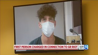 First person charged in Grand Rapids riot
