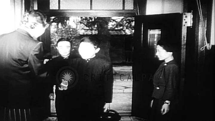 Prince Akihito and fellow pupils arrive at a schoo...
