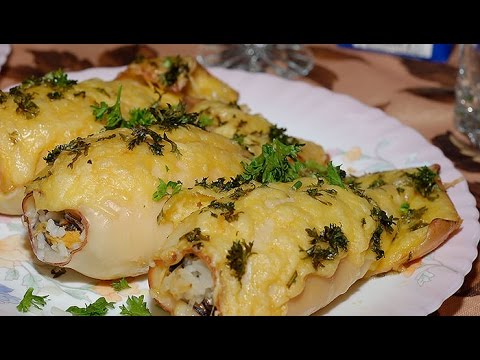 Кальмары фаршированные в духовке с рисом.