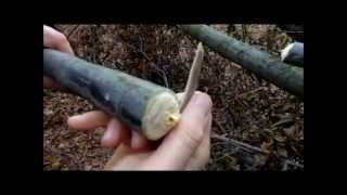 Primitive making stone knife.wmv