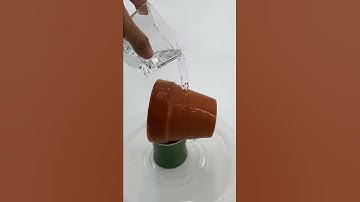 Showing how porous a terracotta pot can be
