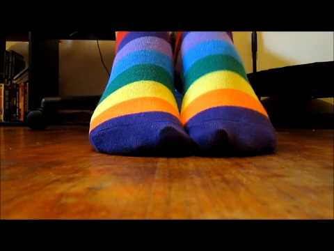 Toe Wiggling in Rainbow Socks