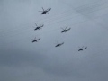 Military helicopters and airplanes flying over Moscow