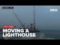 Moving the Algoma lighthouse to repair and renovate dock wall