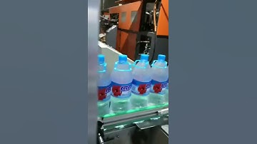 Automatic bottle handle applicator machine