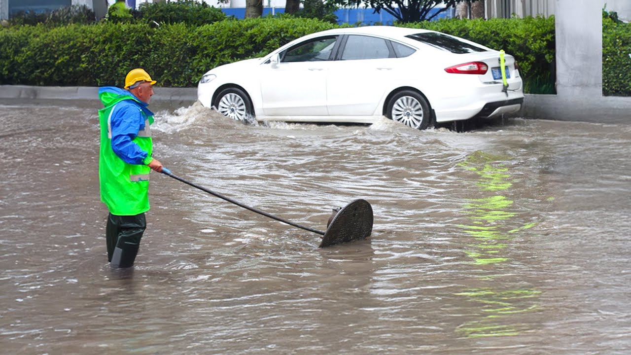 Massive Street Drain Blockage Clearing a Blocked Street Drain - YouTube