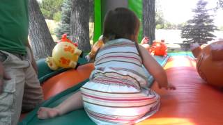 Sayler And Daddy Playing In The Bounce House II