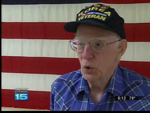 Veterans drop out of parade over "Taps"