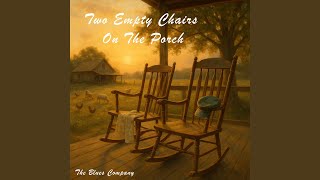 Two Empty Chairs On The Porch