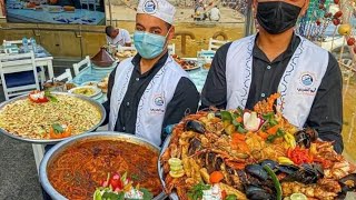 مطعم ابو العربى للمأكولات البحرية التجمع الخامس 😋 السمك في جردل بس تحففففة