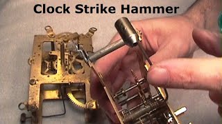 Clock Strike Hammer. Striking a gong, bell or chime rod with hammers.