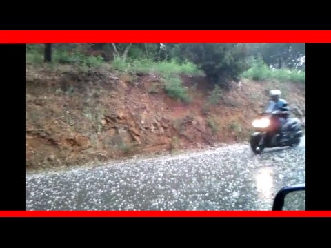 Orage Violent de Grèle dans le Var - Un scooteur sous la Grêle