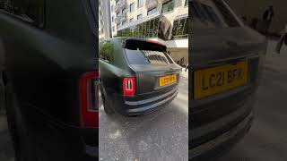 Black Ferrari roaring the engine in central London Cadogan Square 
