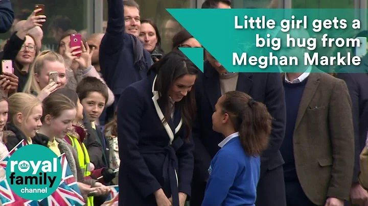 Little girl gets a big hug from Meghan Markle in Birmingham