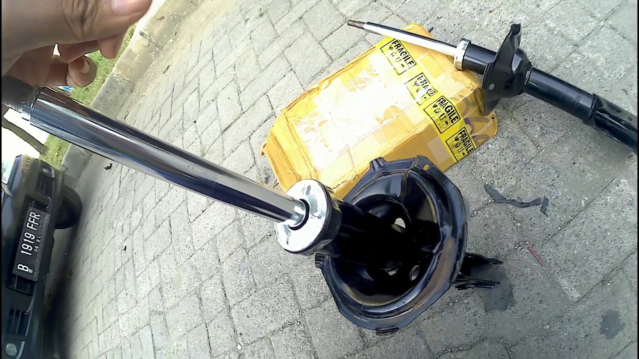 Tutorial singkat Cara ganti shockbreaker depan mobil 