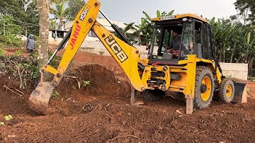 Jcb 3dx digging soil and levelling land 