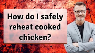 How do I safely reheat cooked chicken?