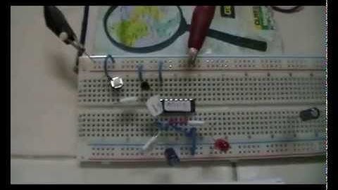 monostable multivibe using 4011 nand gate and npn transistor