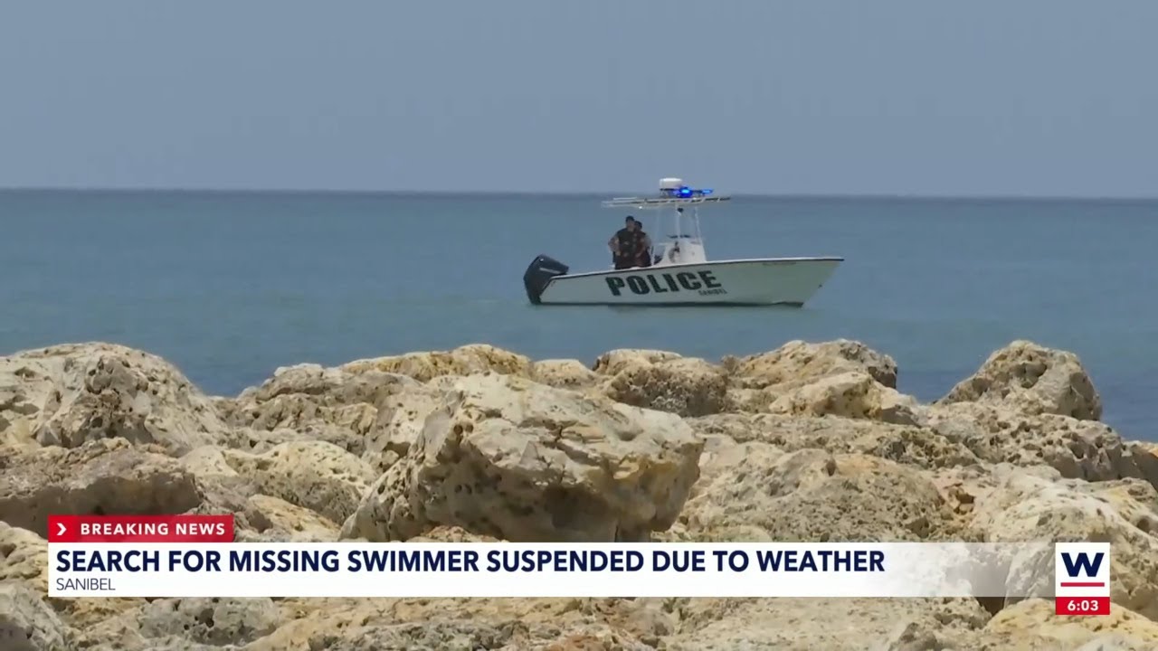 Search suspended for missing swimmer due to weather - YouTube