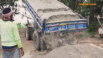 Sand is being load to be unload by the digital hydraulic facility system facility. Tractor Vision 21