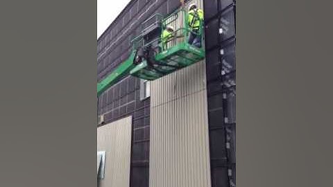 Installing exterior high performance concrete panels to Hamilton College in Syracuse NY