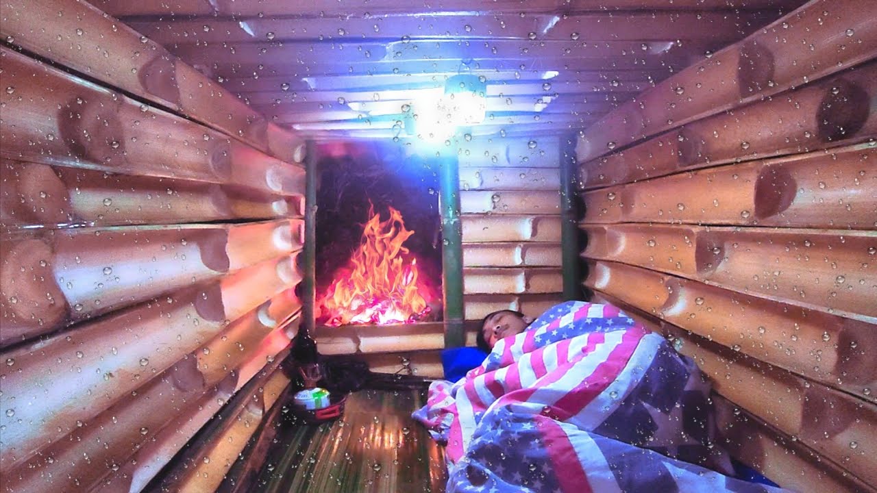 building a warm shelter with a fireplace, camping in heavy rain ...