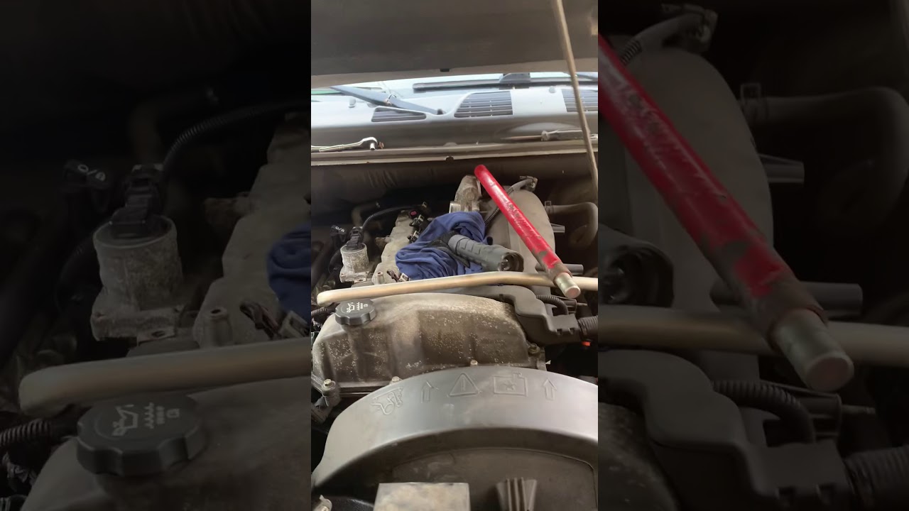 2008 gmc envoy 4.2 temperature sensor removal behind engine not behind