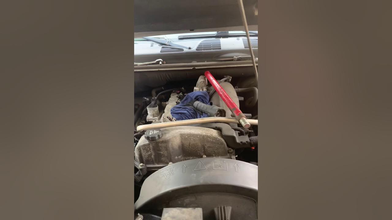 2008 gmc envoy 4.2 temperature sensor removal behind engine not behind