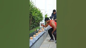 Most coconuts smashed with one hand in one minute - 122 by Abheesh P. Dominic 🥥