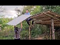 The homeless girl and Mr. Khang quickly finished the roof of the pigsty before it rained.