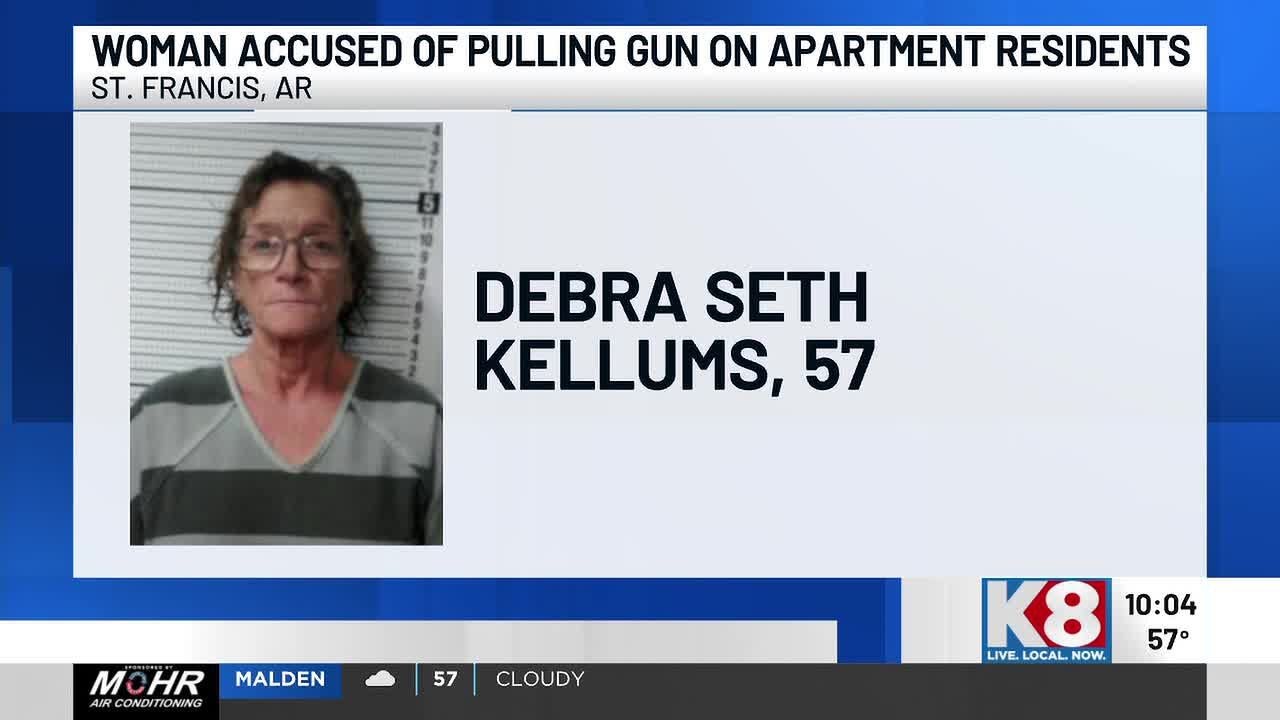 Woman accused of pulling gun on apartment residents - YouTube