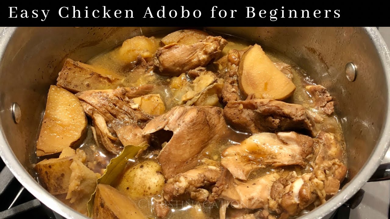 Chicken Adobo and Potatoes for Beginners Filipino food with Soy Sauce and Bay Leaves