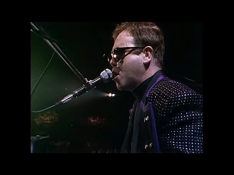 Elton John &
