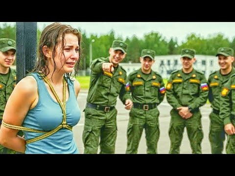 Издевается над связанной девушкой Издевается над связанной девушкой